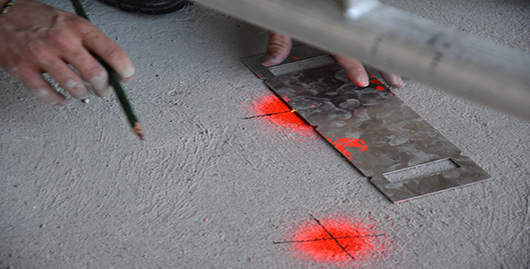 Traçage des points d'ancrage pour le chantier Omega à Bienne, Suisse.